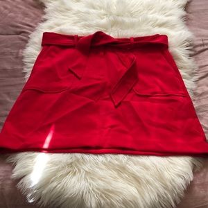 Beautiful red skirt size 10 has pockets on the front